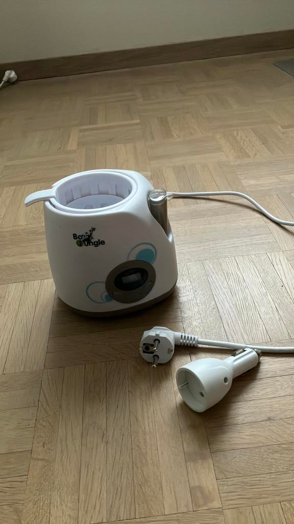 Flesverwarmer kan ook in auto gebruikt worden, Ophalen, Gebruikt