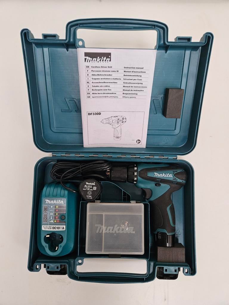 Makita DF330D Accuschroefboormachine, Doe-het-zelf en Bouw, Ophalen, Zo goed als nieuw, Boor- en Schroefmachine, Variabele snelheid