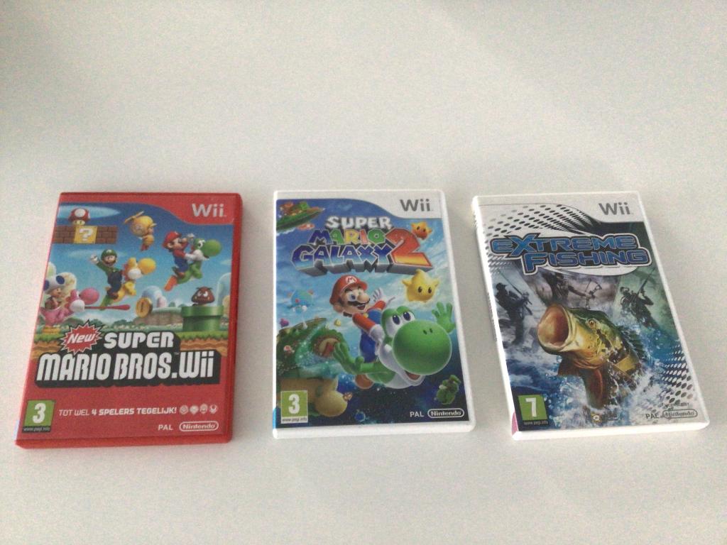 Wii spelletjes:Super Mario, Mario Galaxy 2, Extreme fishing, Ophalen, Gebruikt, Eén computer