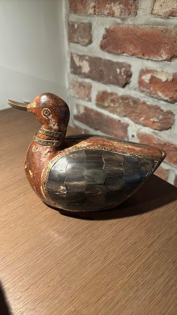Decoratie houten indische eend ingelegd met been, Ophalen