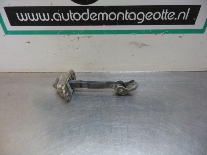 Butée 4portes arrière gauche d'un Nissan Micra (Micra 03-), -, 3 mois de garantie, Utilisé, -