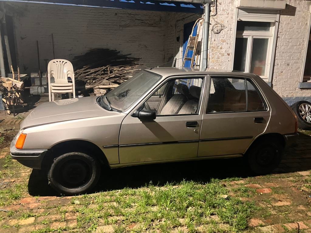 Peugeot 205 1.4 GR, Auto's, Voorwielaandrijving, Stof, Beige, 4 cilinders
