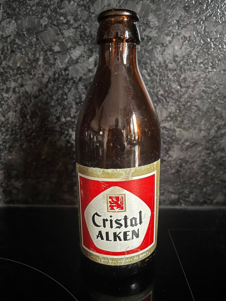 Oud bierflesje Cristal Alken van de jaren 1970, Enlèvement ou Envoi, Comme neuf, Leeuw