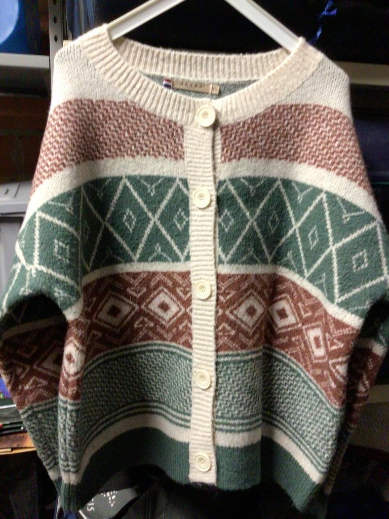 Wollen Gillet ( Noorse print), Ophalen