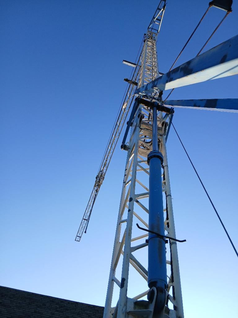 snelmontage bouwkraan te koop max 1500kg giek 22m, Enlèvement, Grue