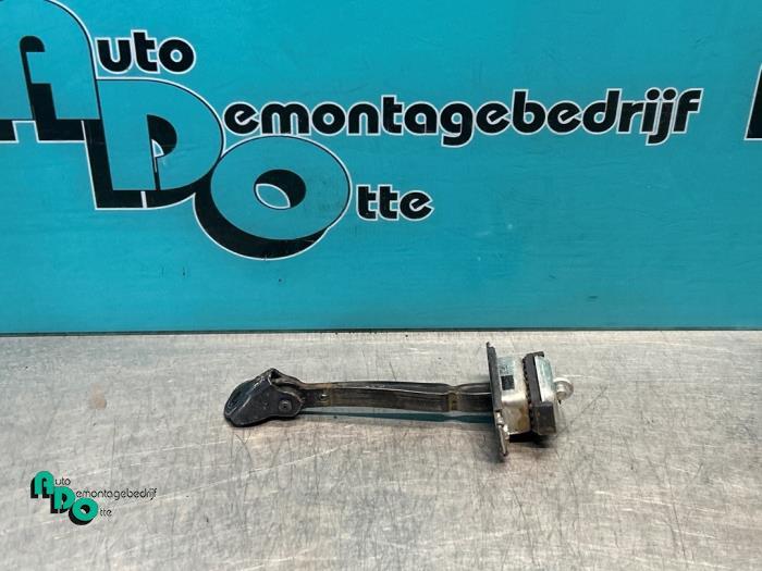 Butée 4portes arrière gauche d'un Honda Civic (Civic 06-), Honda, -, 3 mois de garantie, Utilisé