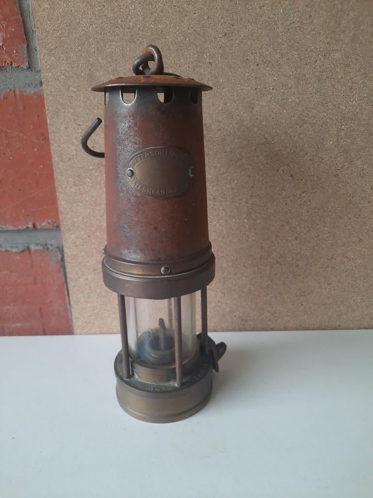 Oude mijnwerkerslamp, Ophalen