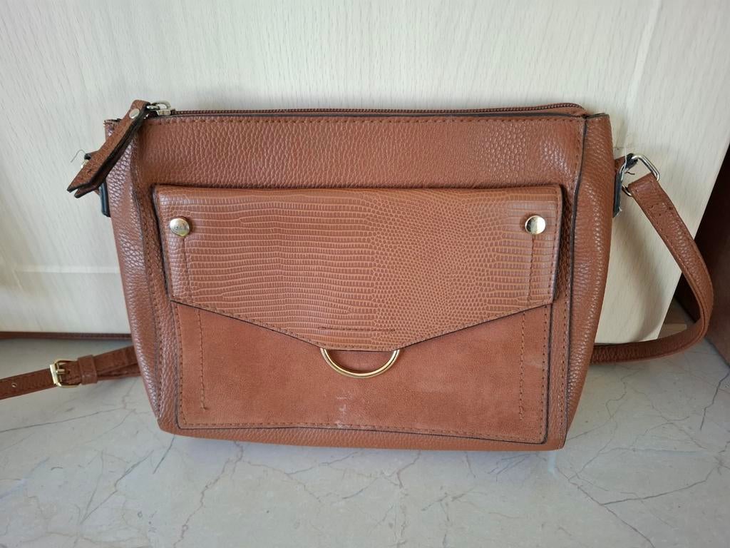 Handtas, Enlèvement, Sac à main