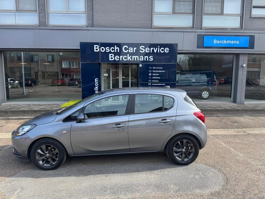 Opel Corsa Enjoy 1.4 Automaat met navigatie, slechts 34100KM, Stof, Gebruikt, Euro 6, 4 cilinders