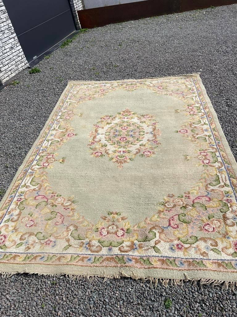 Chinees tapijt, Ophalen