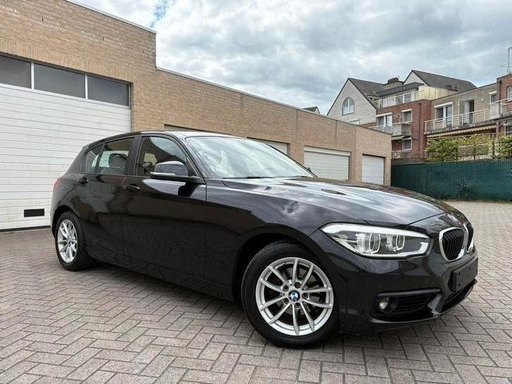 BMW 116 i | 12 Maanden Garantie | 106 Dkm | Benzine | 2018 |, Auto's, BMW, Testrit aan huis, Zwart, USB, 5 deurs