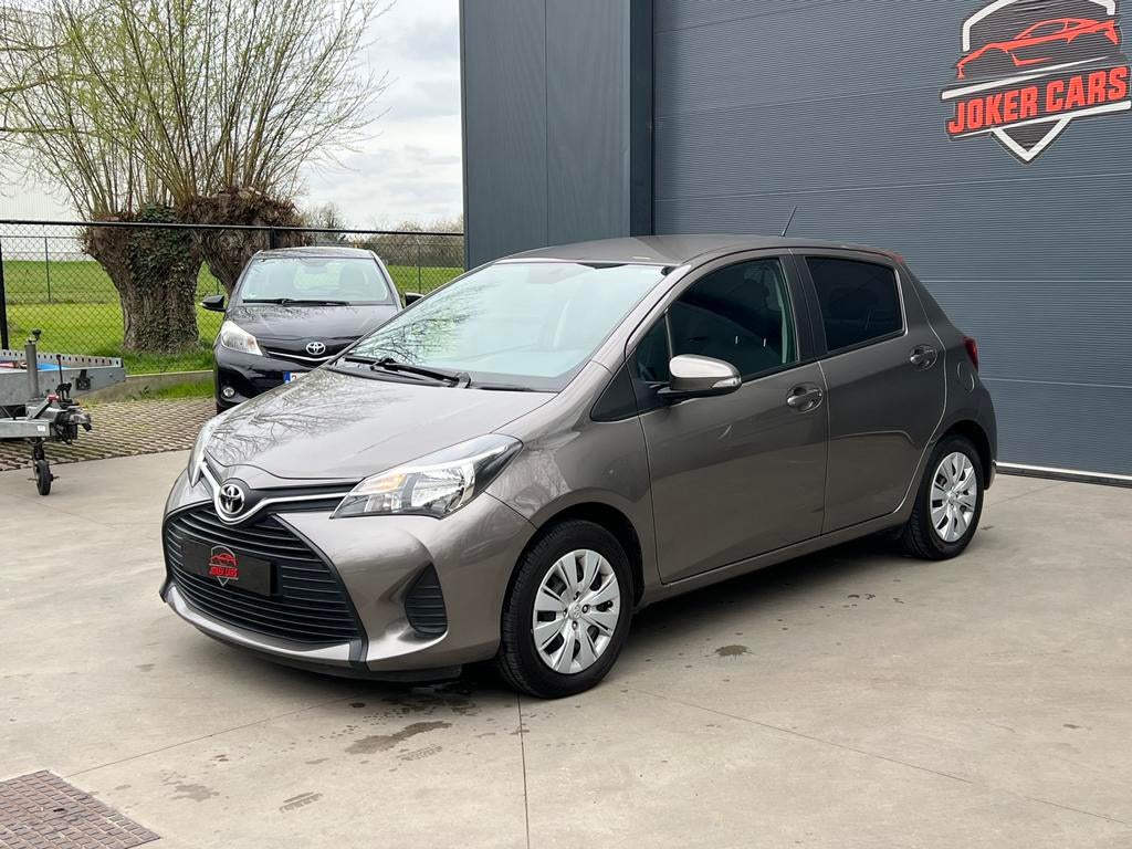 Toyota Yaris 1.33i VVT-i Navigatie Airco EURO6B, Autos, Toyota, Argent ou Gris, Euro 6, Entreprise, Boîte manuelle