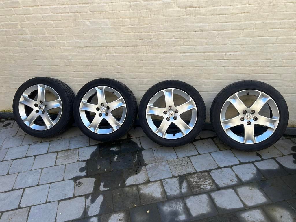 Peugeot alu 17” velgen met Pirelli P7 225/45 91Y, Ophalen, Zomerbanden, Band(en)