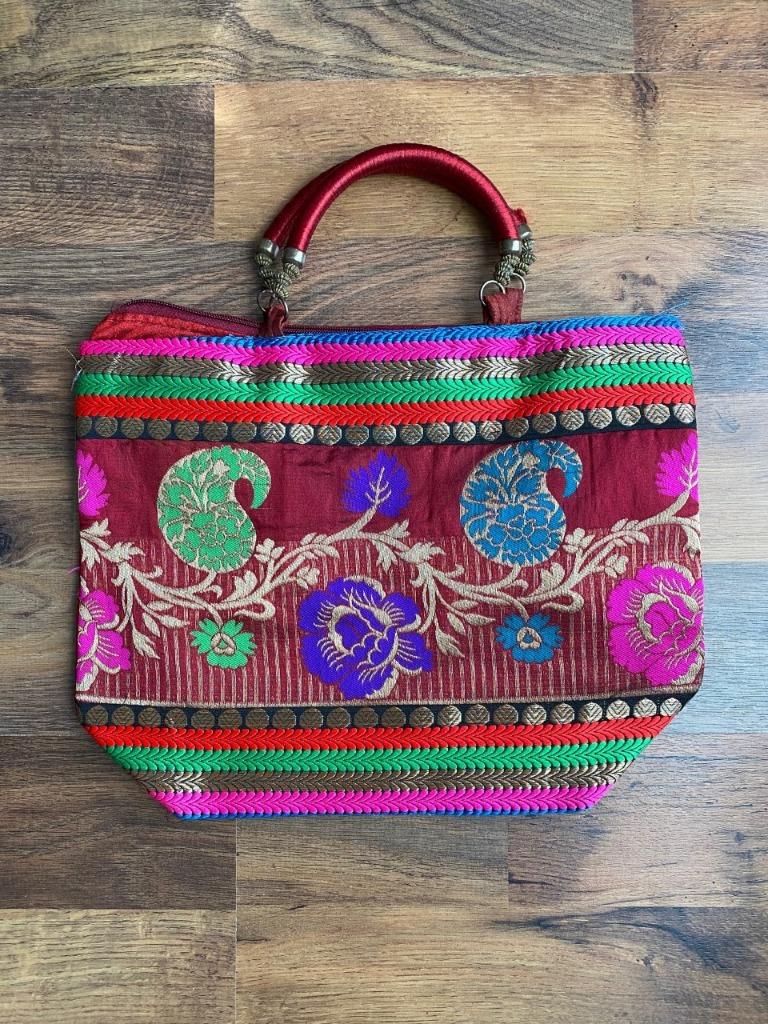 Kleurrijk handtasje, Envoi, Utilisé