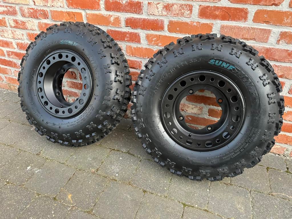 Verschillende setten Quadbanden op velgen.