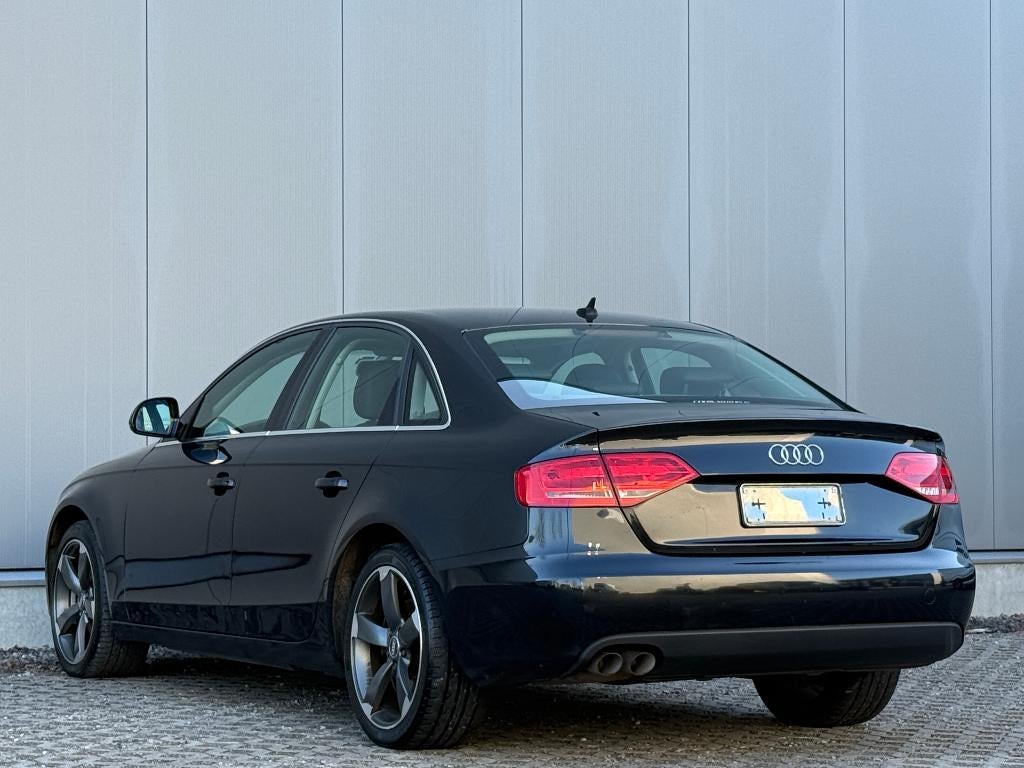 Audi A4 2.0 TDi Berline Cruise Navi Airco Leder, Auto's, 139 g/km, Zwart, 4 cilinders, A4
