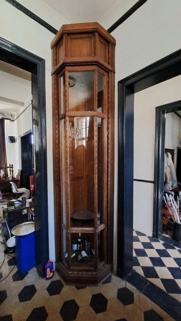 antieke hoge glazen hoekkast, Ophalen