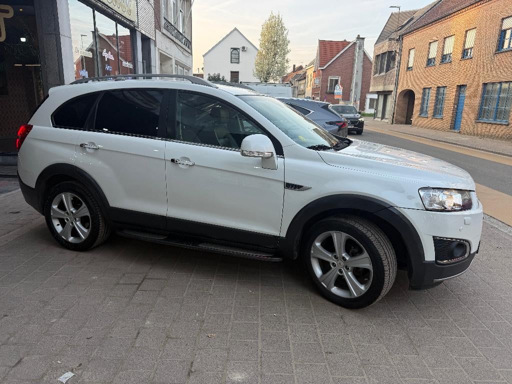 Chevrole Captiva 2.2Cdti 7Place 4x4 *1er Main car pass*, Auto's, Chevrolet, Euro 5, Zwart, Wit, Parkeersensor
