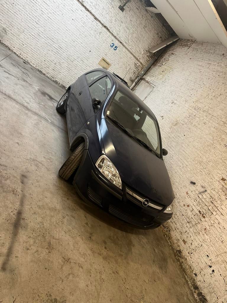 LEES BESCHRIJVING! Opel corsa c benzine weinig km met airco, Auto's, Voorwielaandrijving, Stof, Zwart, Blauw