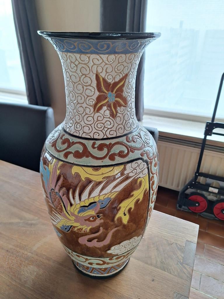 Grand vase chinois, Ophalen