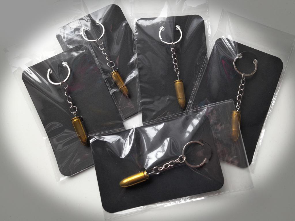 25 sleutelhangers 9mm ONKLAAR ONBRUIKBAAR, Collections, Objets militaires | Général, Armée de terre, Enlèvement ou Envoi