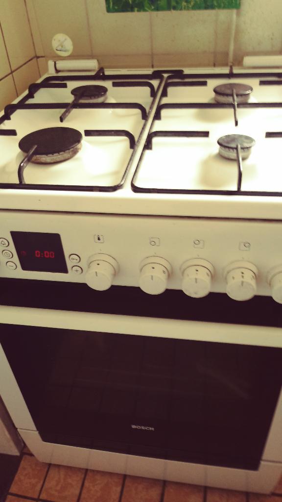 Gasfornuis met elektrische oven Bosch, Ophalen, 4 kookzones, Zo goed als nieuw, Gas