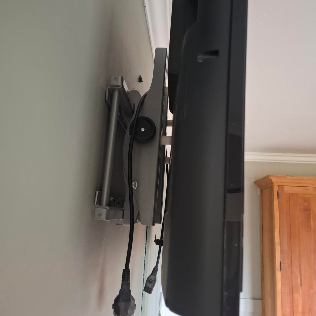 TV avec support mural, Enlèvement