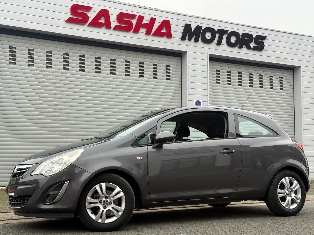 Opel Corsa 1.2 Benzine '11 | Airco | Top Staat | 12MGarantie, Voorwielaandrijving, Stof, Zwart, Bedrijf