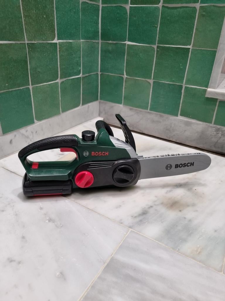 Fausse Tronçonneuse (Bosch) enfants, Enfants & Bébés, Enlèvement, Comme neuf