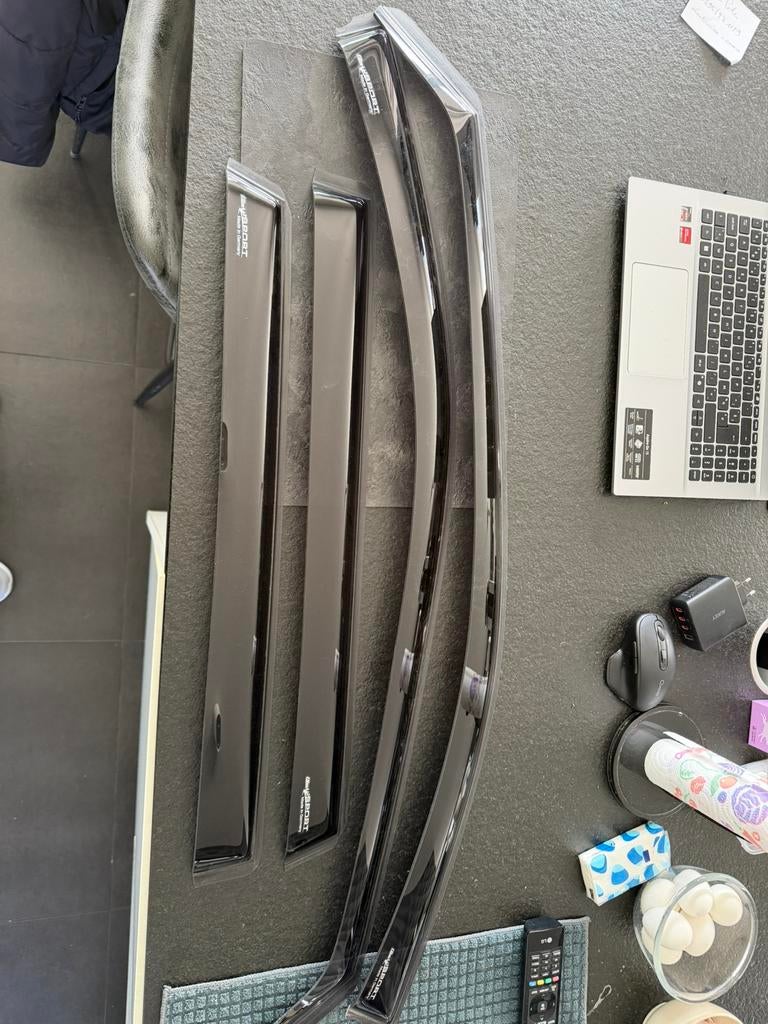 Nissan X-Trail windgeleiders en kofferbeschermer, Ophalen