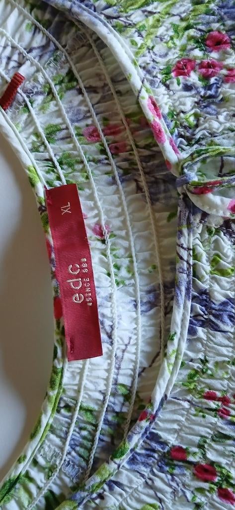 Bloemig blousje, Ophalen