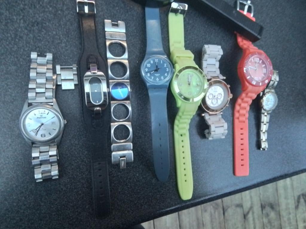 Lot 8 horloges pontiac swatch ICE watch storm oozoo, Handtassen en Accessoires, Horloges | Dames, Ophalen of Verzenden, Swatch