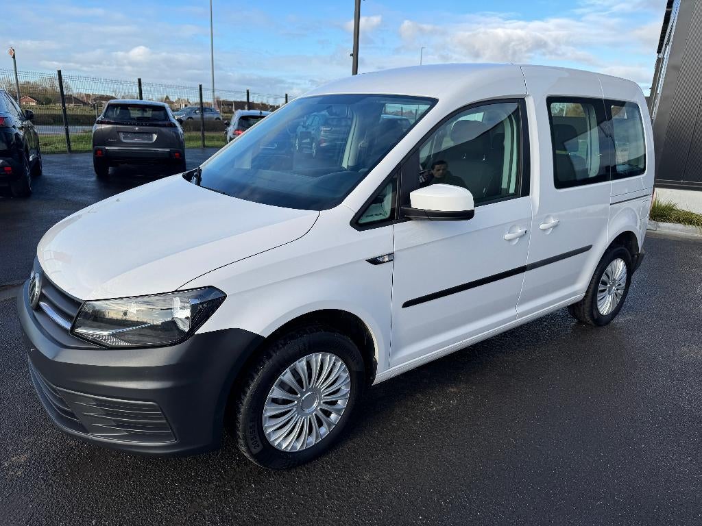 Volkswagen Caddy 5pl 1.4 benzine 1st eigenaar ohboek, Voorwielaandrijving, 4 cilinders, Wit, 5 deurs