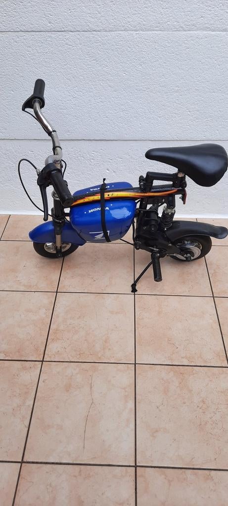 Honda, Electrische kinderstep met nieuwe Batterijen ,15kmph, Vélos & Vélomoteurs, Trottinettes, Enlèvement, Utilisé, Autres types