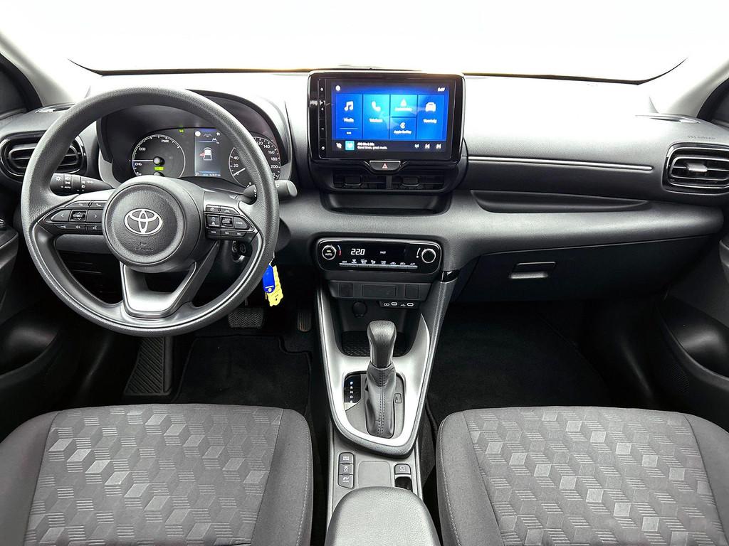 Toyota Yaris 1.5 VVT-i Hybrid 85kW Dynamic e-CVT | Achteruit, Auto's, Gebruikt, Overige kleuren, 116 pk, 450 kg