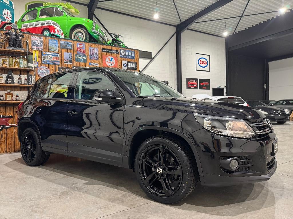 volkswagen tiguan 1.4 benzine - topstaat - garantie -, Auto's, Volkswagen, Euro 5, Stof, Zwart, 4 cilinders