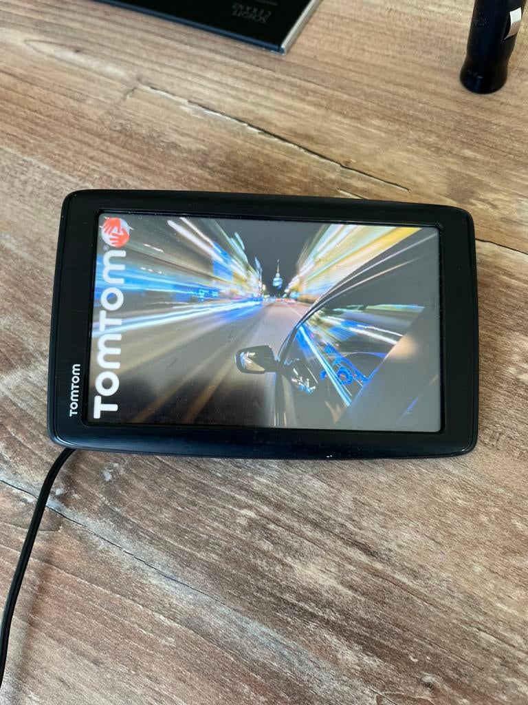 Tom tom go, Ophalen of Verzenden, Zo goed als nieuw