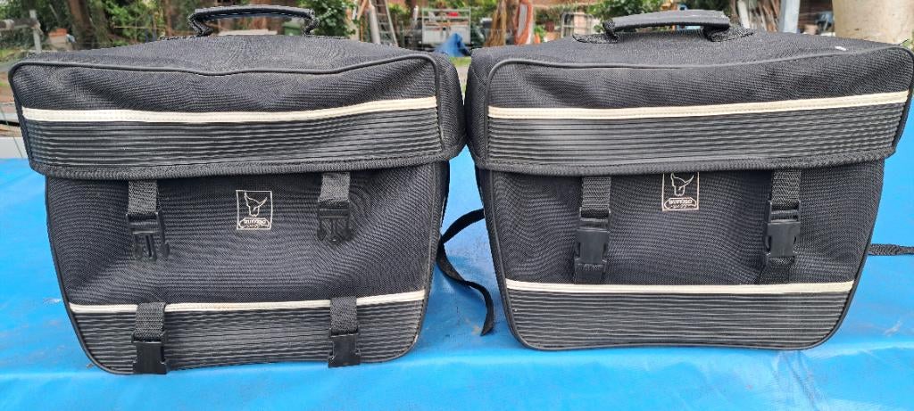 Zadeltassen, Ophalen, Gebruikt