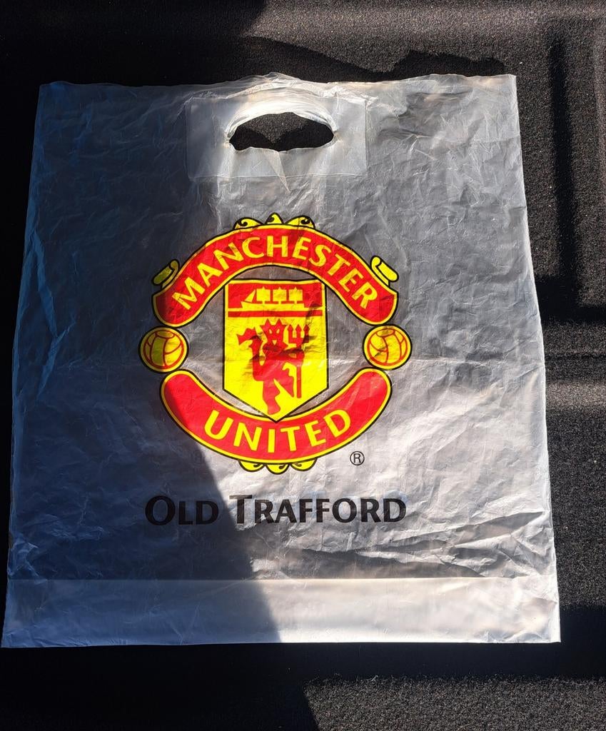 Plastic zak van Manchester United. Gekocht bij Old Trafford, Ophalen of Verzenden, Zo goed als nieuw