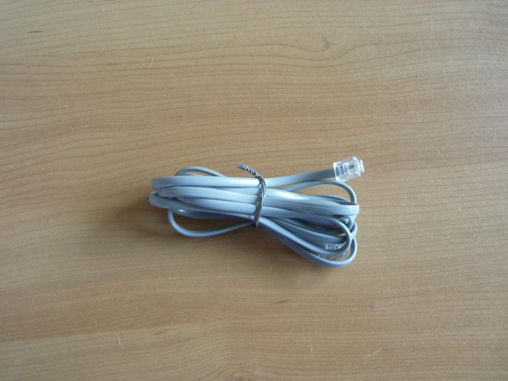 Grijze platte RJ11 6P2C internetkabel 1,8m, Computers en Software, Pc- en Netwerkkabels, Ophalen of Verzenden