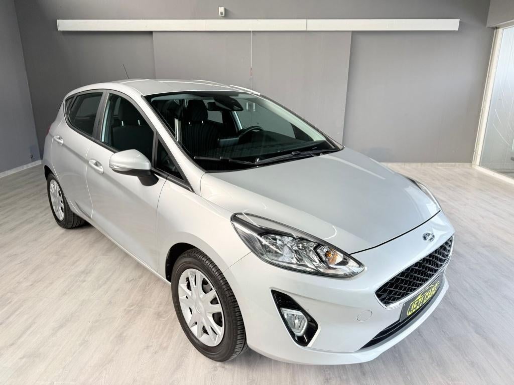 Ford Fiesta 1.1i Business Class * 1Jaar Garantie, Auto's, Voorwielaandrijving, Stof, 5 deurs, Zilver of Grijs