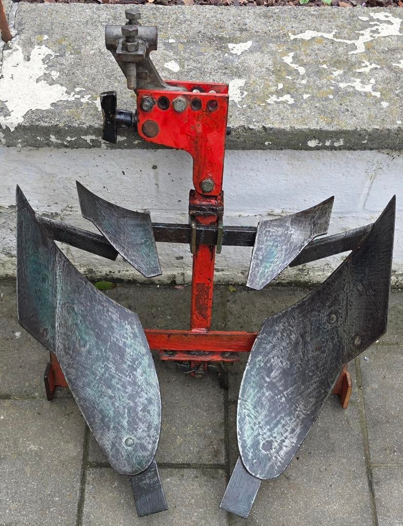 Charrue à deux socs pour motoculteur., Enlèvement