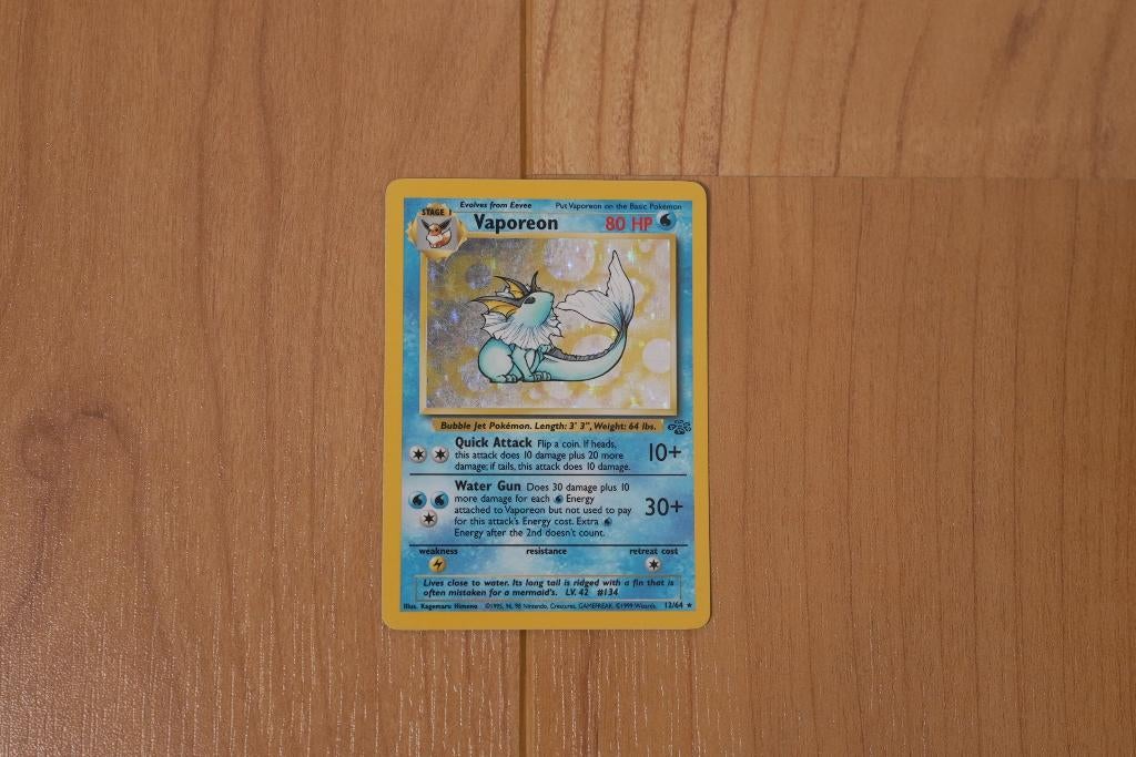 Vaporeon Holo – Jungle Unlimited 1999 - PSA 7 schatting, Ophalen of Verzenden, Gebruikt, Losse kaart
