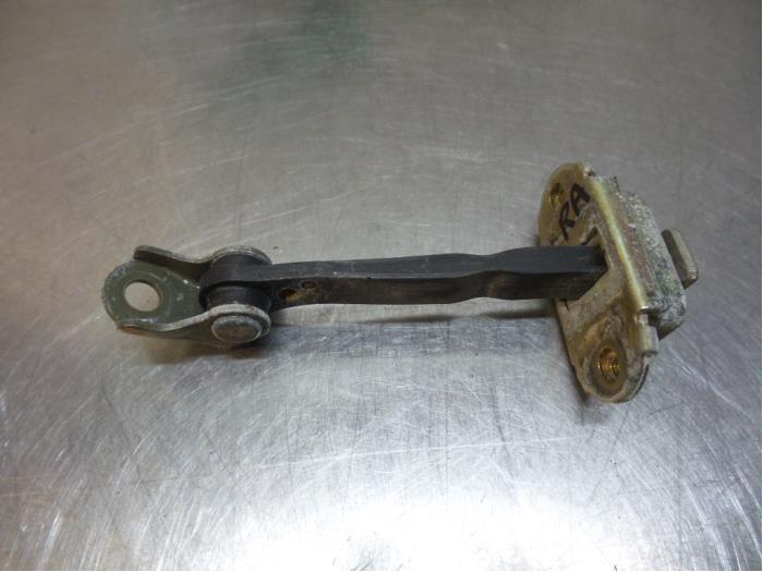 Butée 4portes arrière droite d'un Nissan Micra (Micra 03-), -, 3 mois de garantie, Utilisé, -