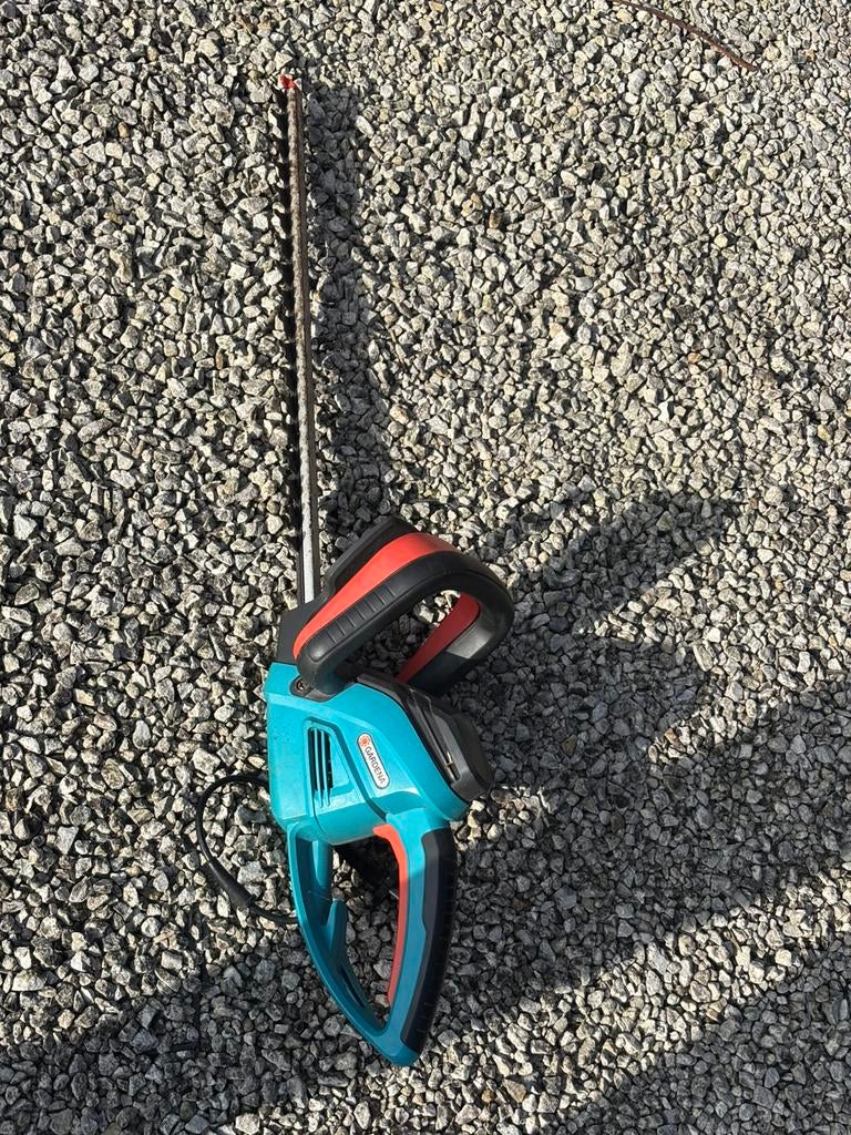 Elektrische heggenschaar, Ophalen