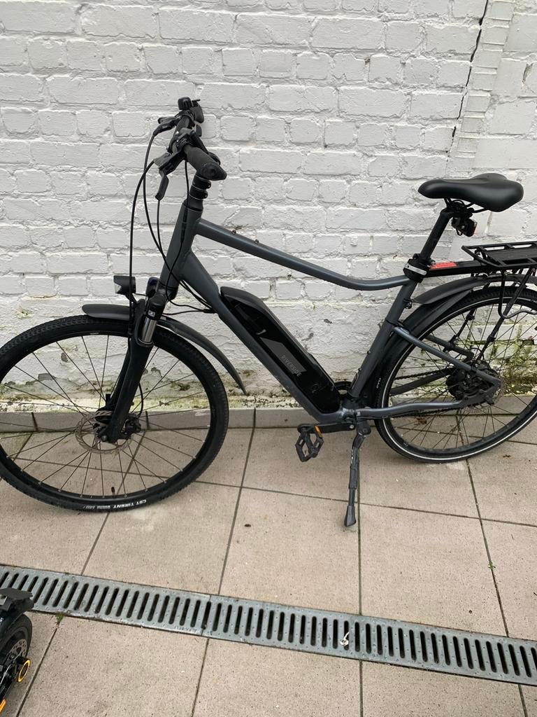 Decathlon elektrische fiets, Ophalen, Gebruikt, 30 tot 50 km per accu, Overige merken