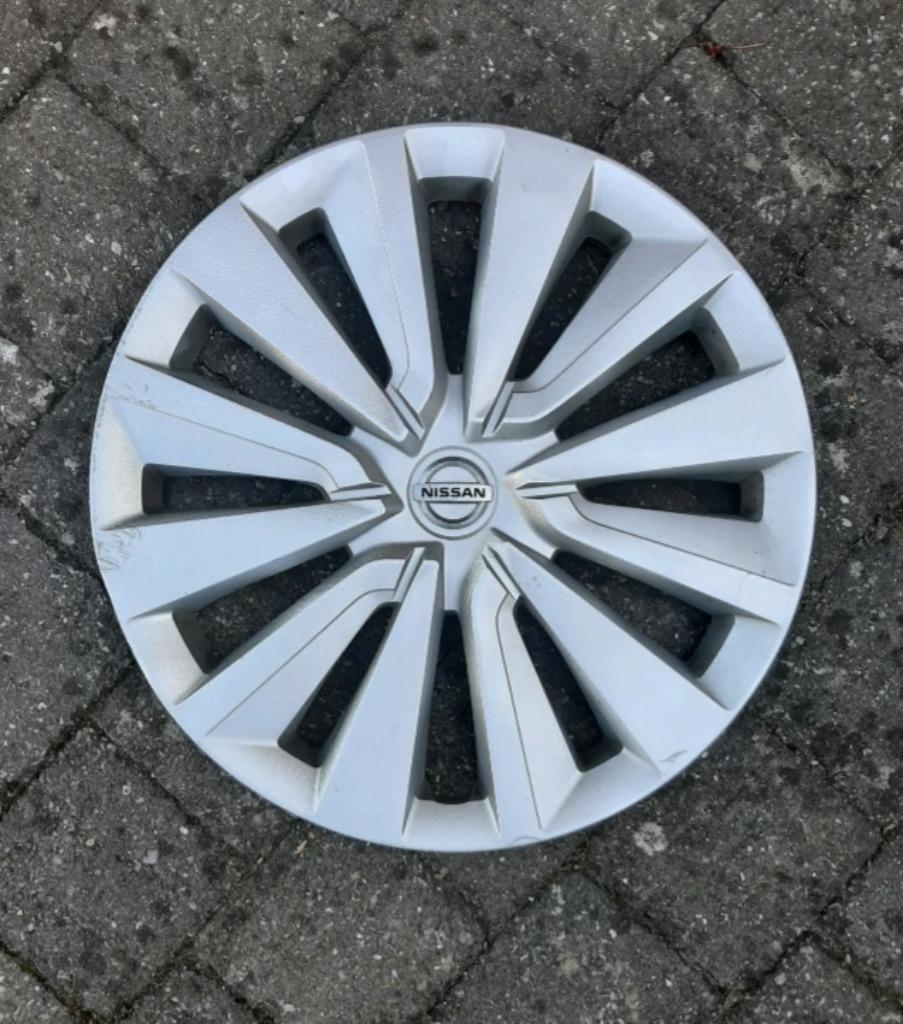 1 enjoliveur Nissan 15 pouces, Autos : Divers, Enjoliveurs, Enlèvement, Comme neuf
