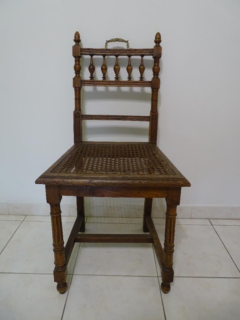 Antieke stoel met rattan cane webbing zitvlak, Ophalen