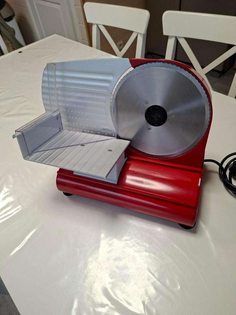 broodsnijmachine domo, Ophalen