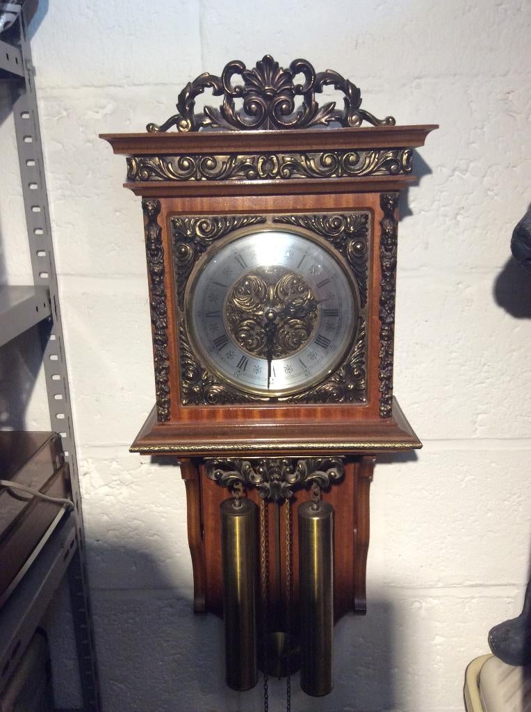 Antieke hangklok, Ophalen